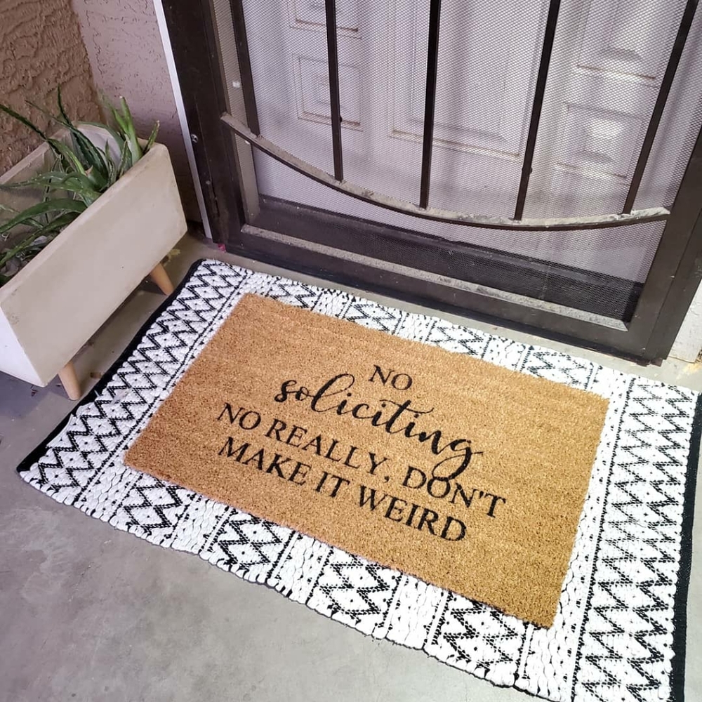 No soliciting welcome mat